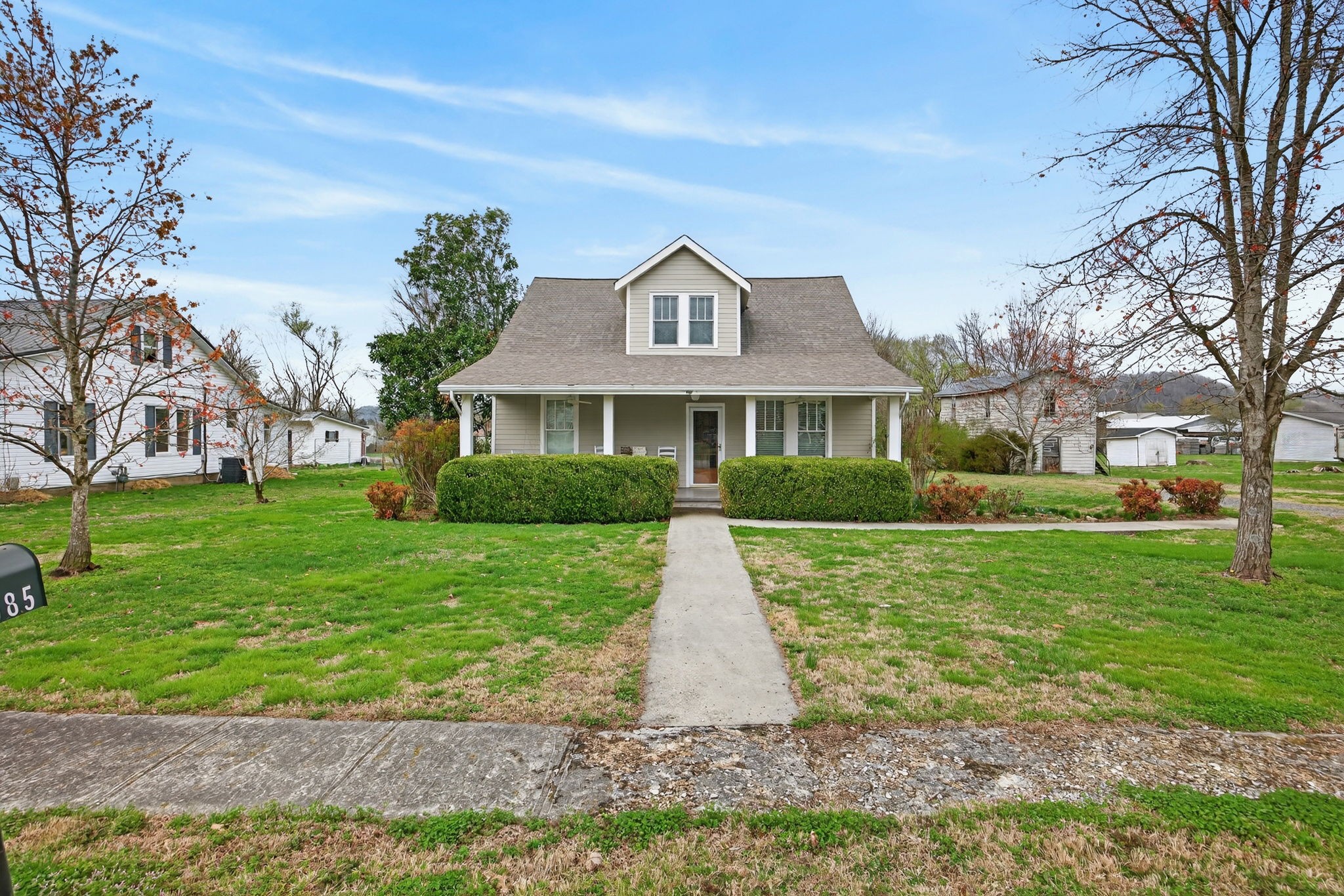 1385 Mitchell Street Celina, TN 38551 - Photo 29 of 35 a front view of house with yard and green space