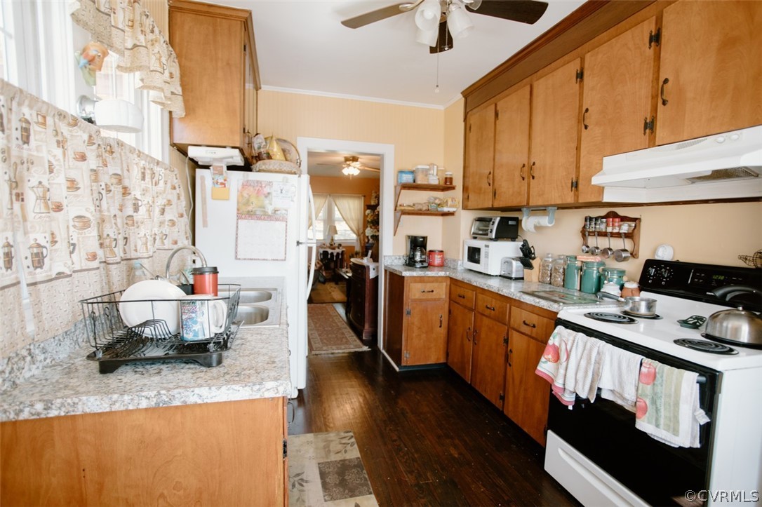 2199 Aspen Road Phenix, VA 23959 - Photo 22 of 47 a kitchen with stainless steel appliances granite countertop a sink a stove and a refrigerator