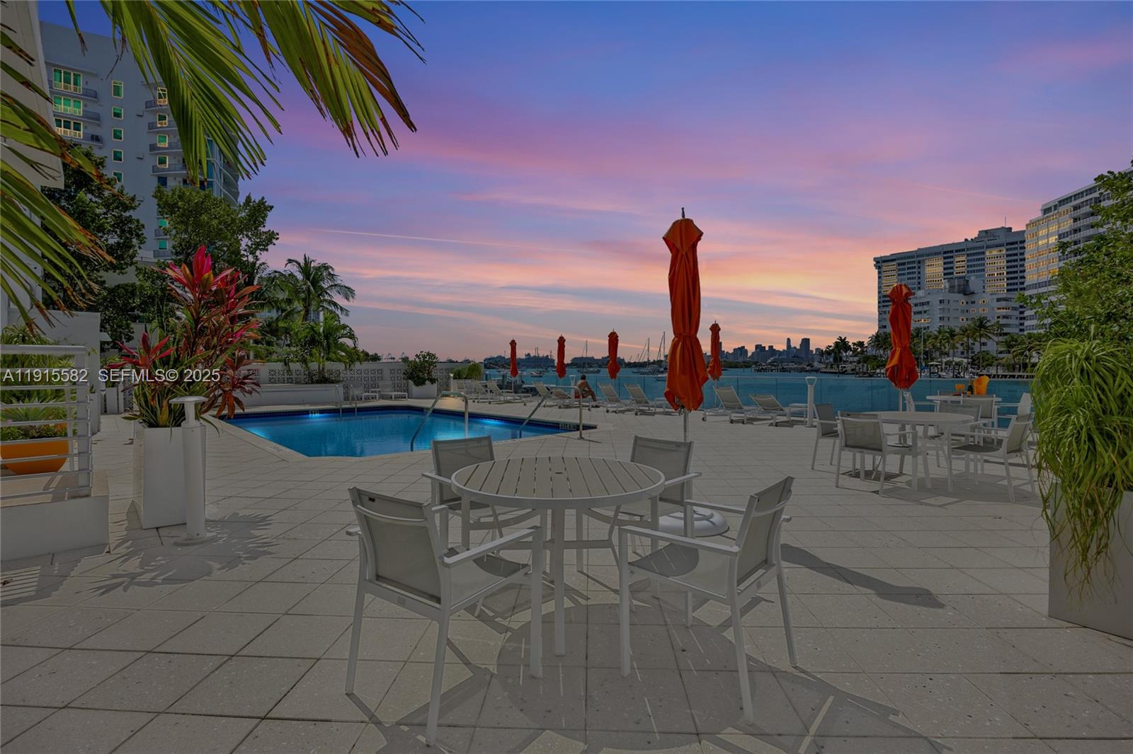 1450 Lincoln Road, Unit 1003 Miami Beach, FL 33139 - Photo 16 of 27 a view of a terrace with furniture