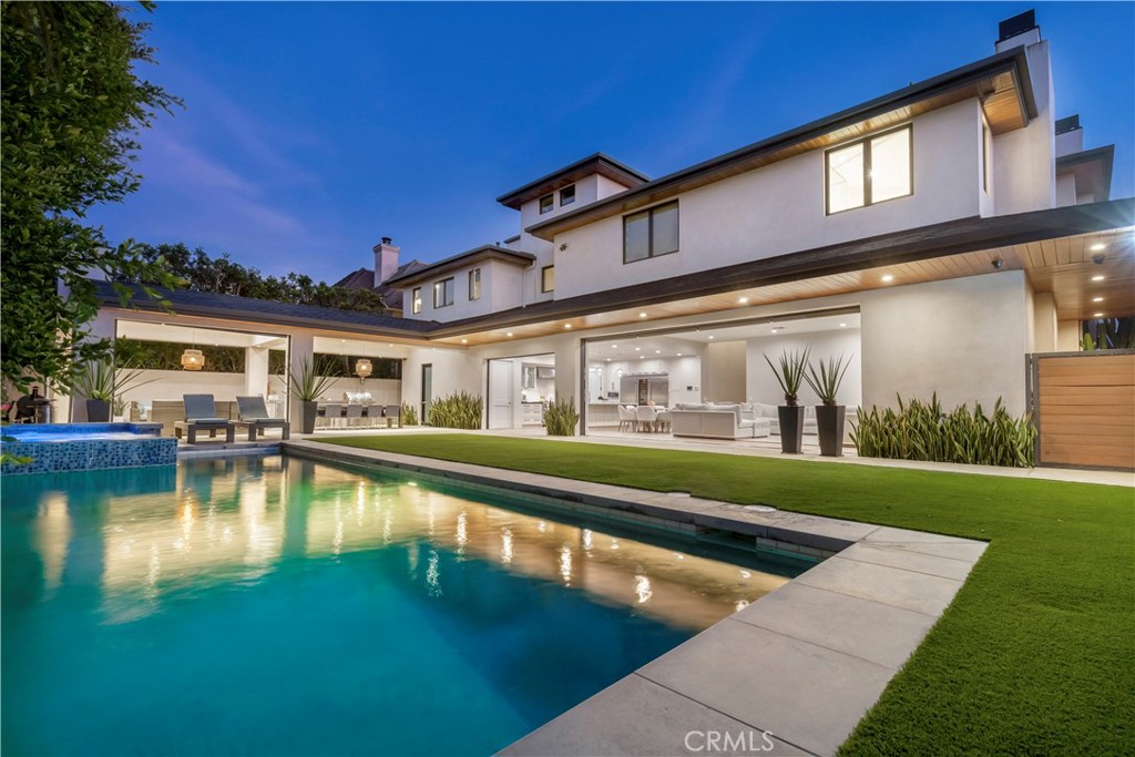 660 Kings Road Newport Beach, CA 92663 - Photo 2 of 41 a view of a house with swimming pool