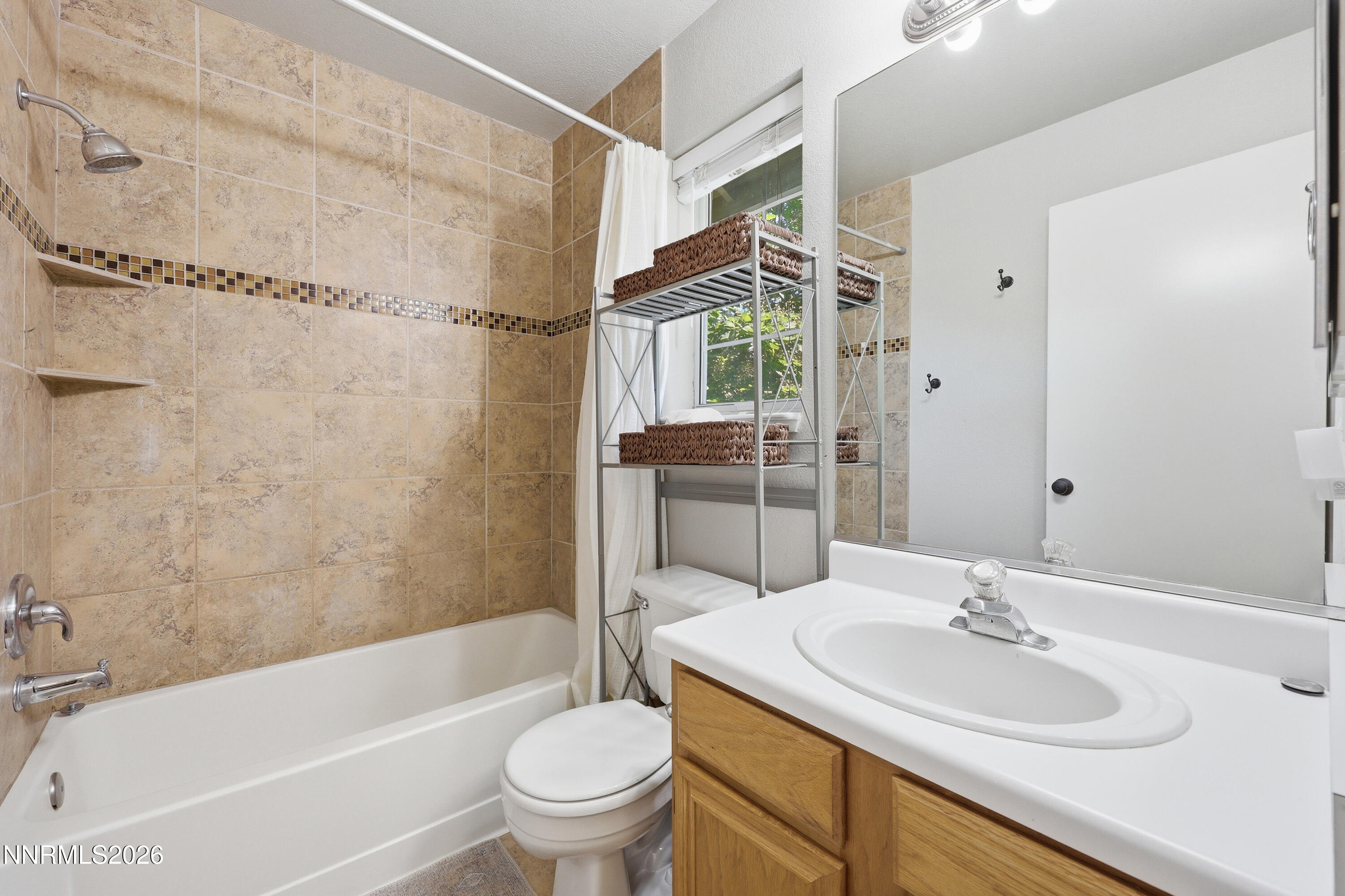 1899 Tuolumne Drive Reno, NV 89523 - Photo 26 of 44 a bathroom with a sink toilet and shower
