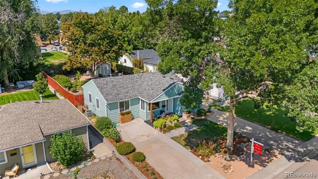 a aerial view of a house with a yard