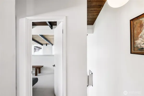 a picture of a bathroom with a mirror