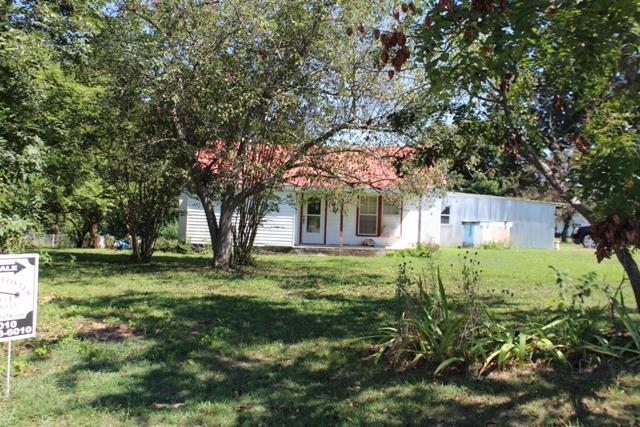 436 Smartt Station Road Morrison, TN 37357 - Photo 3 of 13 a backyard of a house with lots of green space