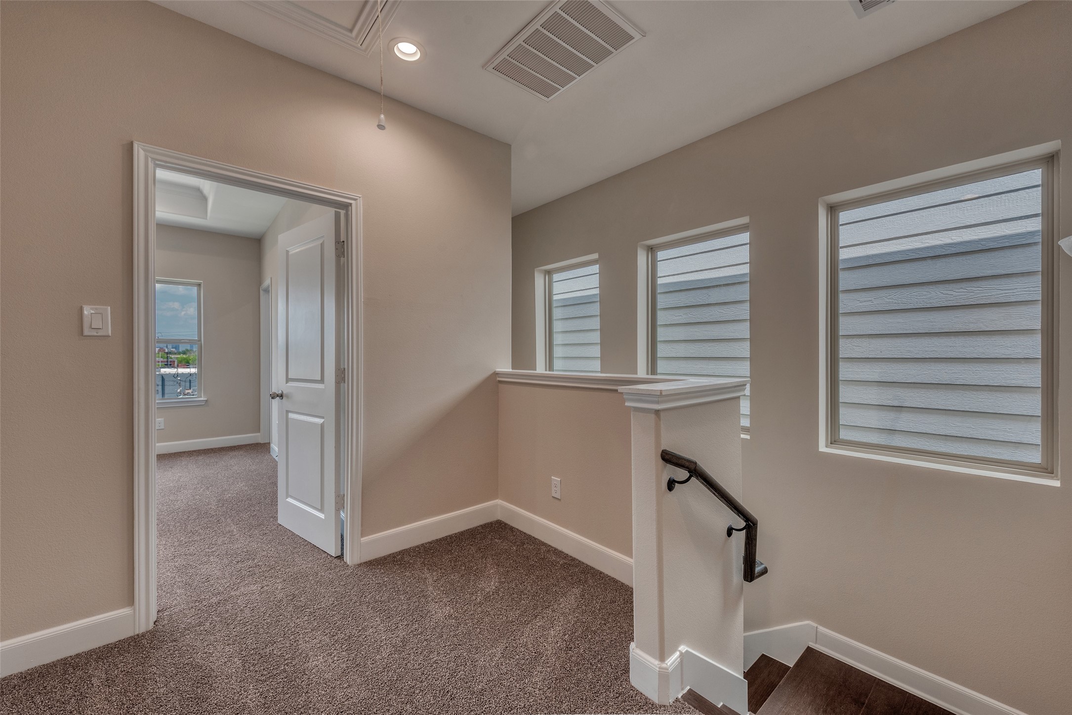 4135 Du Pont Street Houston, TX 77021 - Photo 25 of 30 wooden floor and windows in a room