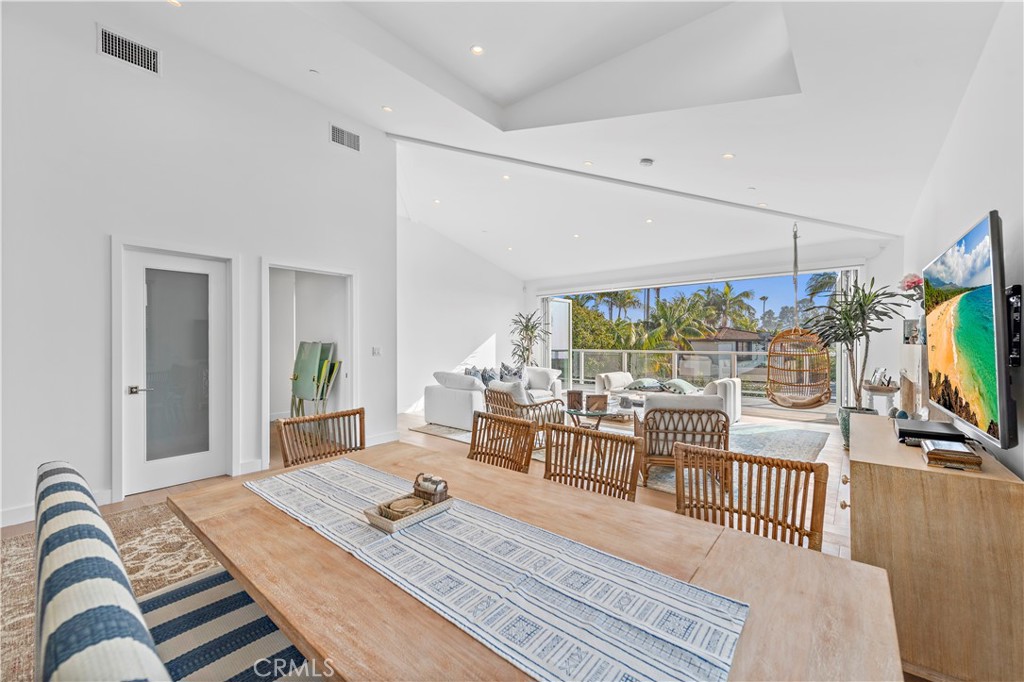 219 Emerald Bay Laguna Beach, CA 92651 - Photo 11 of 52 a living room with furniture and a flat screen tv