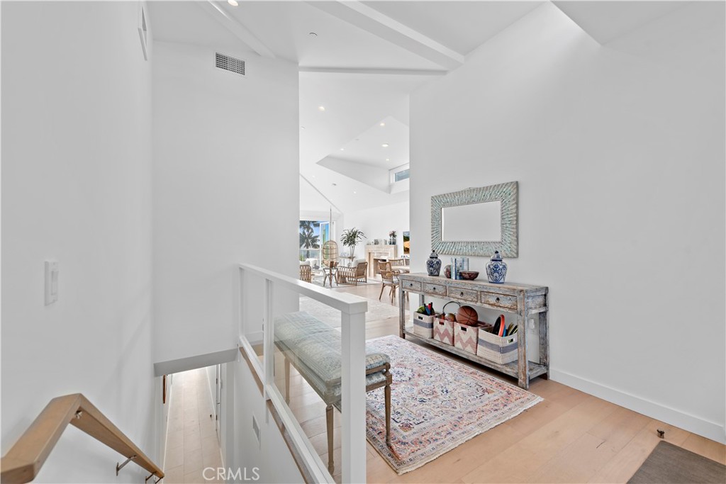 219 Emerald Bay Laguna Beach, CA 92651 - Photo 21 of 52 a living room with furniture and a mirror
