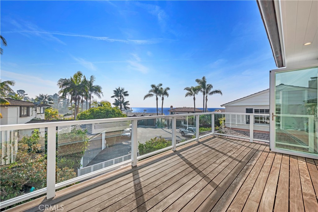 219 Emerald Bay Laguna Beach, CA 92651 - Photo 24 of 52 a view of a balcony with wooden floor