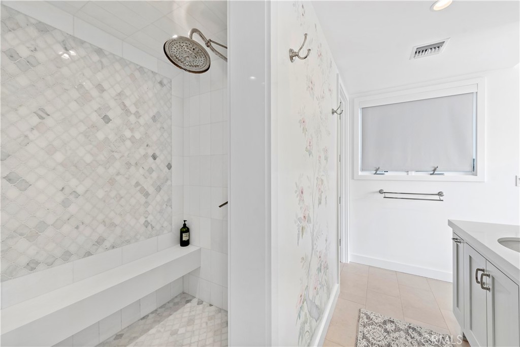 219 Emerald Bay Laguna Beach, CA 92651 - Photo 31 of 52 a bathroom with a bathtub and a shower