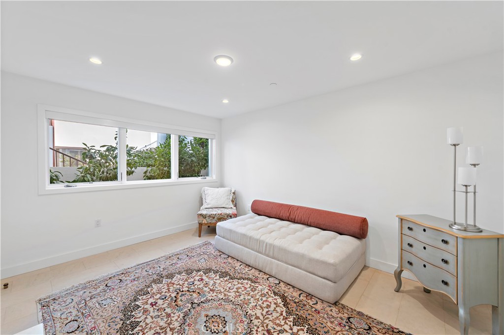 219 Emerald Bay Laguna Beach, CA 92651 - Photo 36 of 52 a living room with furniture and a window