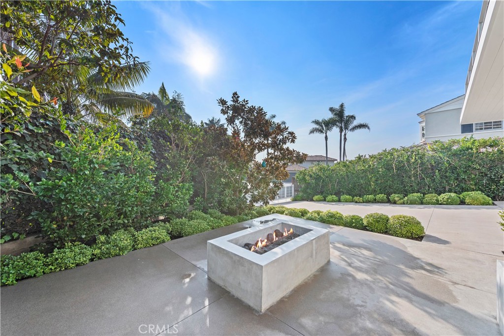 219 Emerald Bay Laguna Beach, CA 92651 - Photo 41 of 52 a view of a garden with a bench in a garden