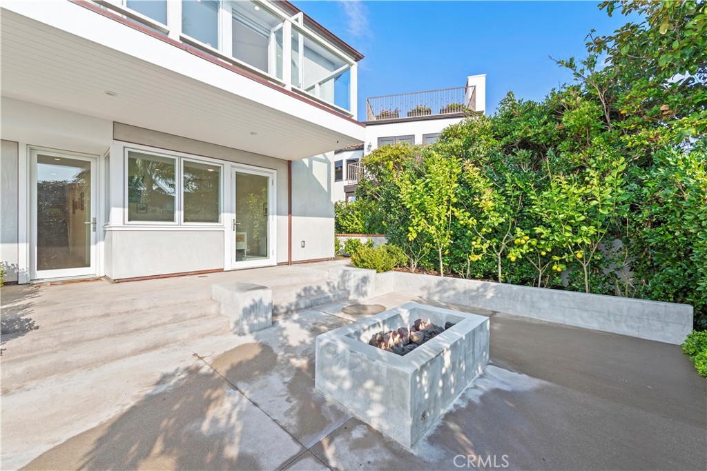 219 Emerald Bay Laguna Beach, CA 92651 - Photo 43 of 52 a front view of a house with a yard