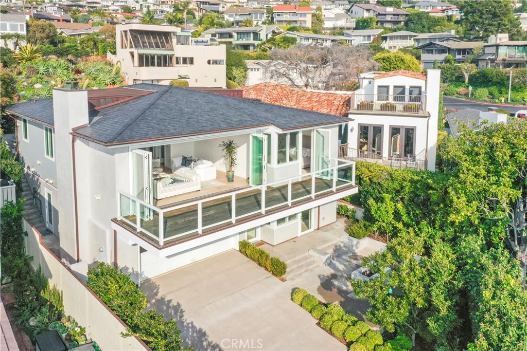 219 Emerald Bay Laguna Beach, CA 92651 - Photo 50 of 52 an aerial view of multi story residential apartment building with a yard