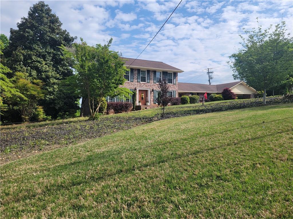 a view of house with outdoor space