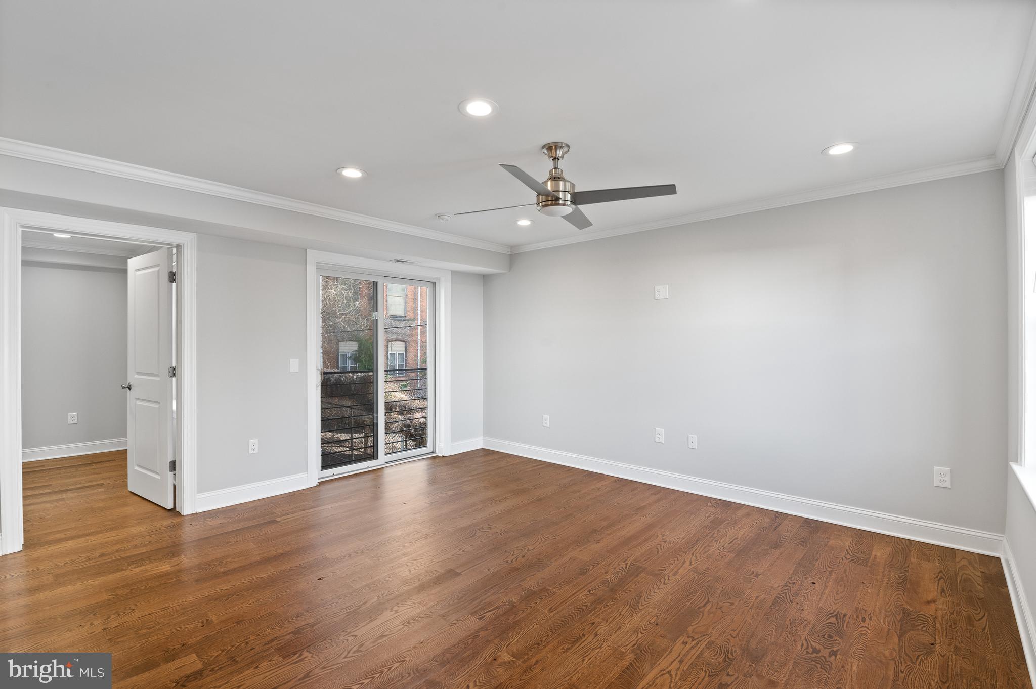 988 North Marshall Street, Unit 2R Philadelphia, PA 19123 - Photo 14 of 29 a view of an empty room with wooden floor