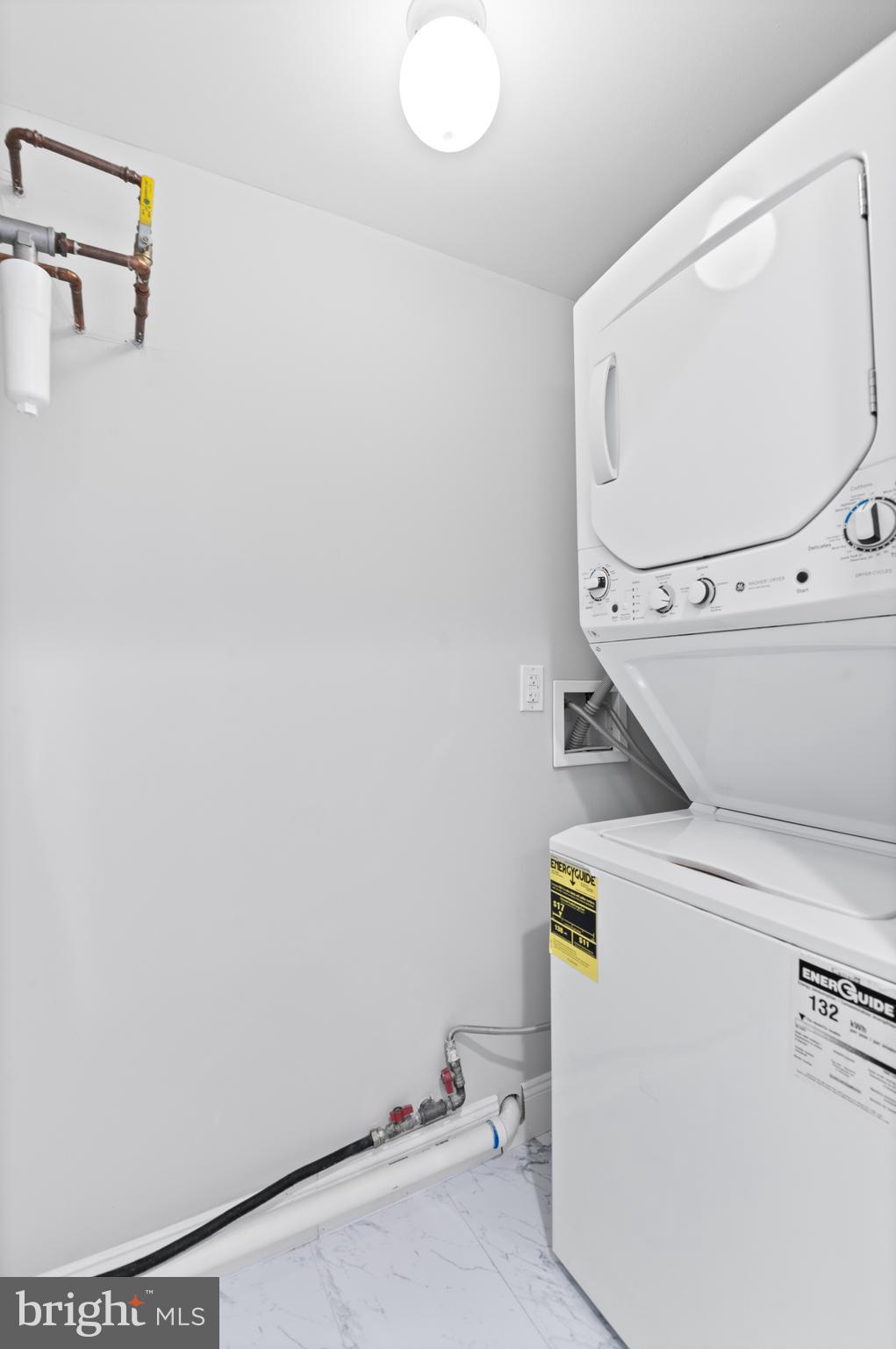 988 North Marshall Street, Unit 2R Philadelphia, PA 19123 - Photo 27 of 29 a utility room with dryer and washer