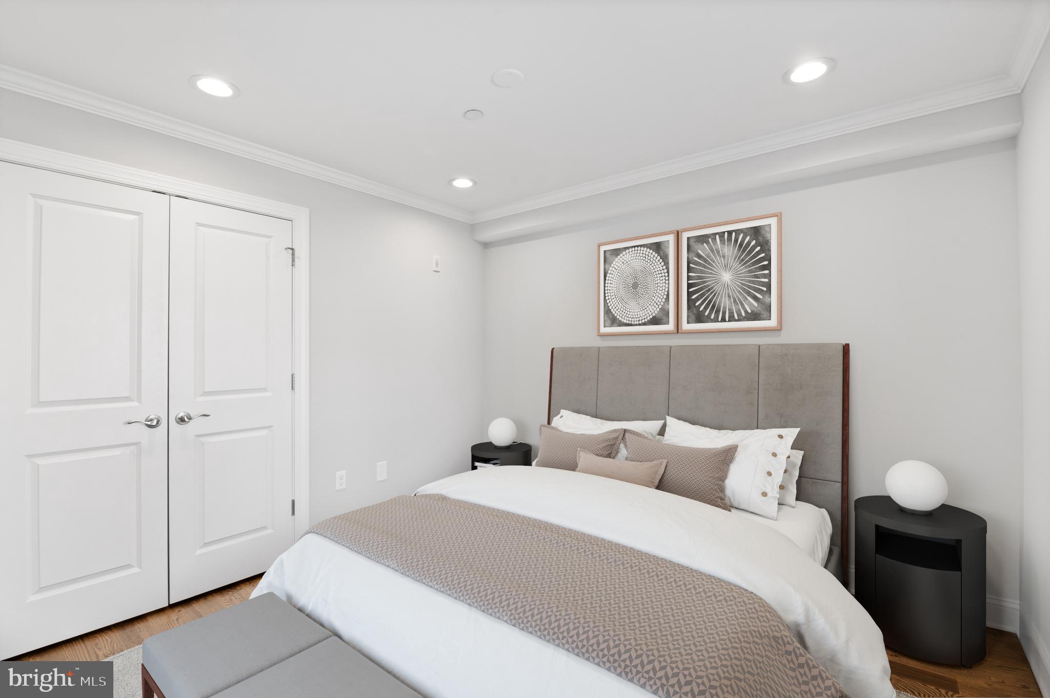 988 North Marshall Street, Unit 2R Philadelphia, PA 19123 - Photo 5 of 29 a bedroom with bed and cupboard
