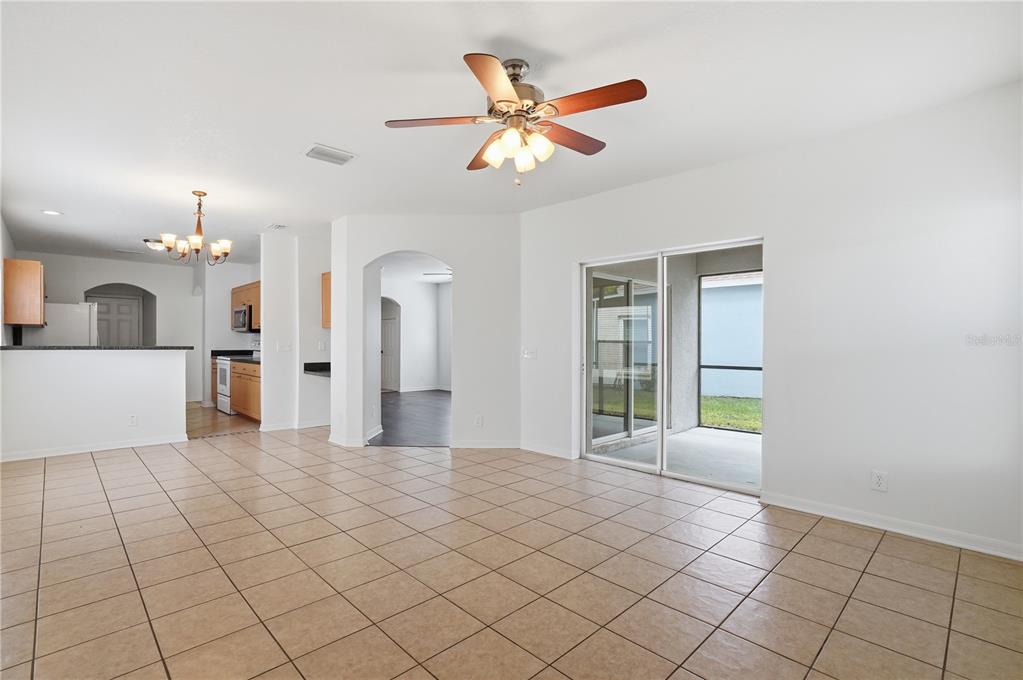 4155 Day Bridge Place Ellenton, FL 34222 - Photo 15 of 42 a view of a livingroom with a ceiling fan and window