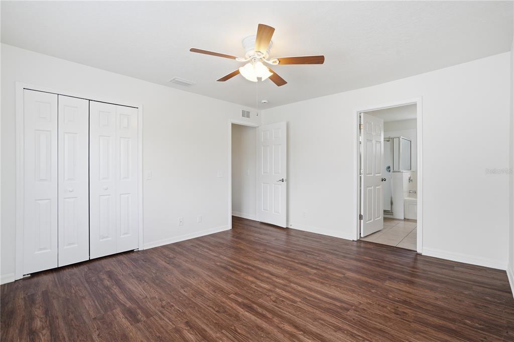 4155 Day Bridge Place Ellenton, FL 34222 - Photo 27 of 42 a view of an empty room with wooden floor