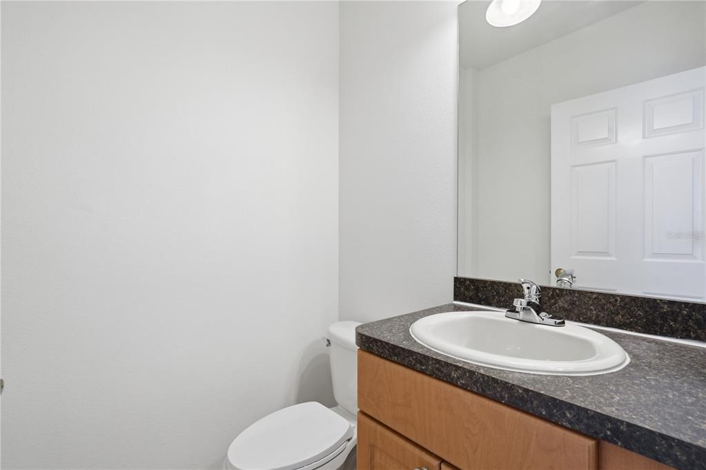 4155 Day Bridge Place Ellenton, FL 34222 - Photo 34 of 42 a bathroom with a granite countertop sink and a mirror