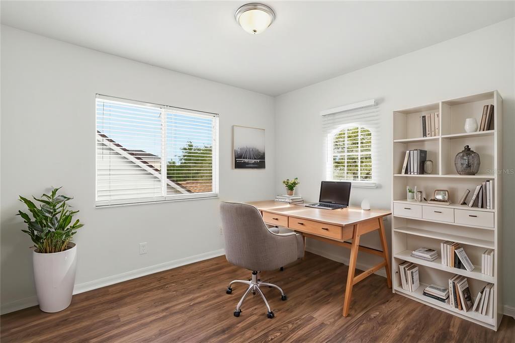 4155 Day Bridge Place Ellenton, FL 34222 - Photo 6 of 42 a workspace with furniture window and wooden floor
