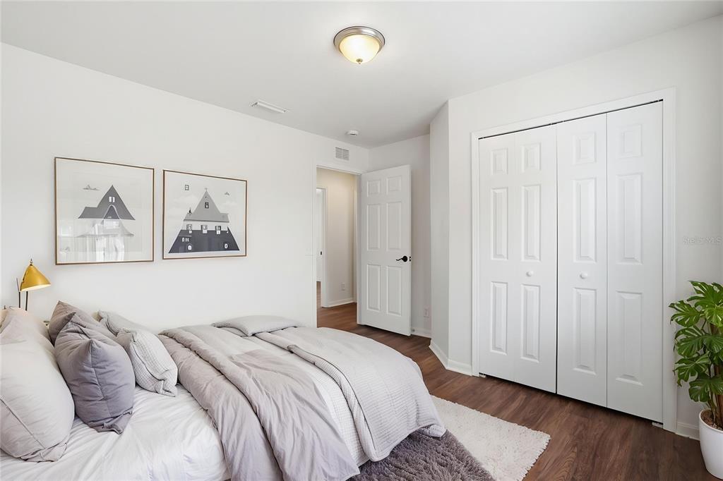 4155 Day Bridge Place Ellenton, FL 34222 - Photo 7 of 42 a bedroom with a bed and a painting on the wall