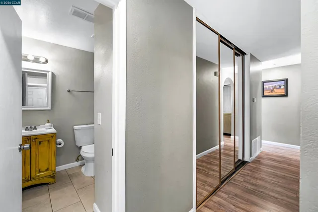 a kitchen with a sink cabinets and appliances