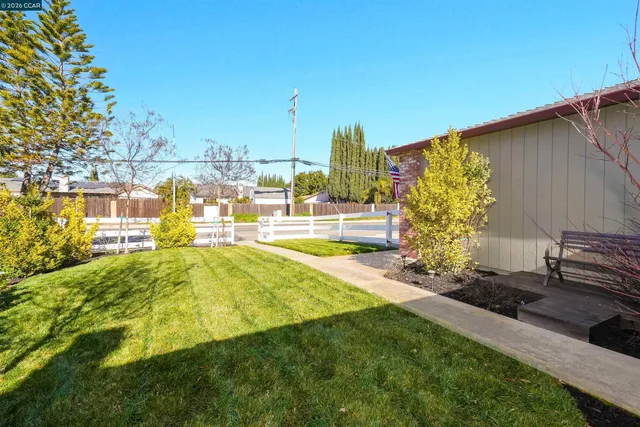 a view of a terrace with a back yard