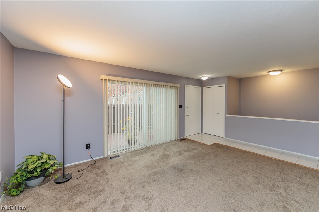 6472 State Road, Unit J19 Parma, OH 44134 - Photo 8 of 33 View of carpeted empty room