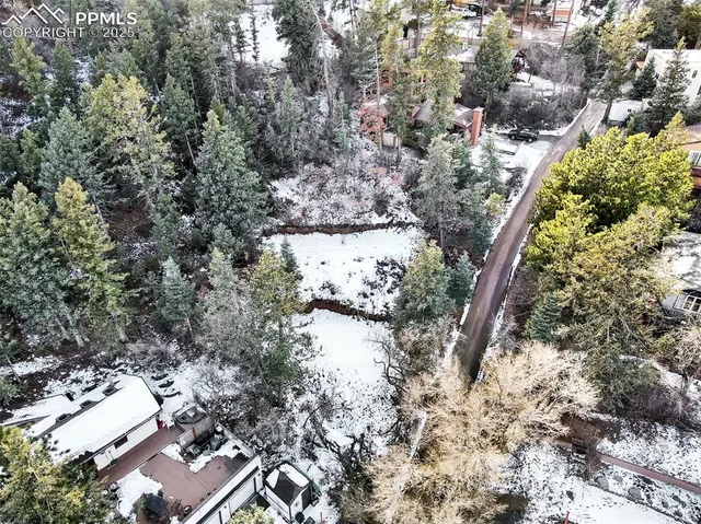 an aerial view of residential house with outdoor space