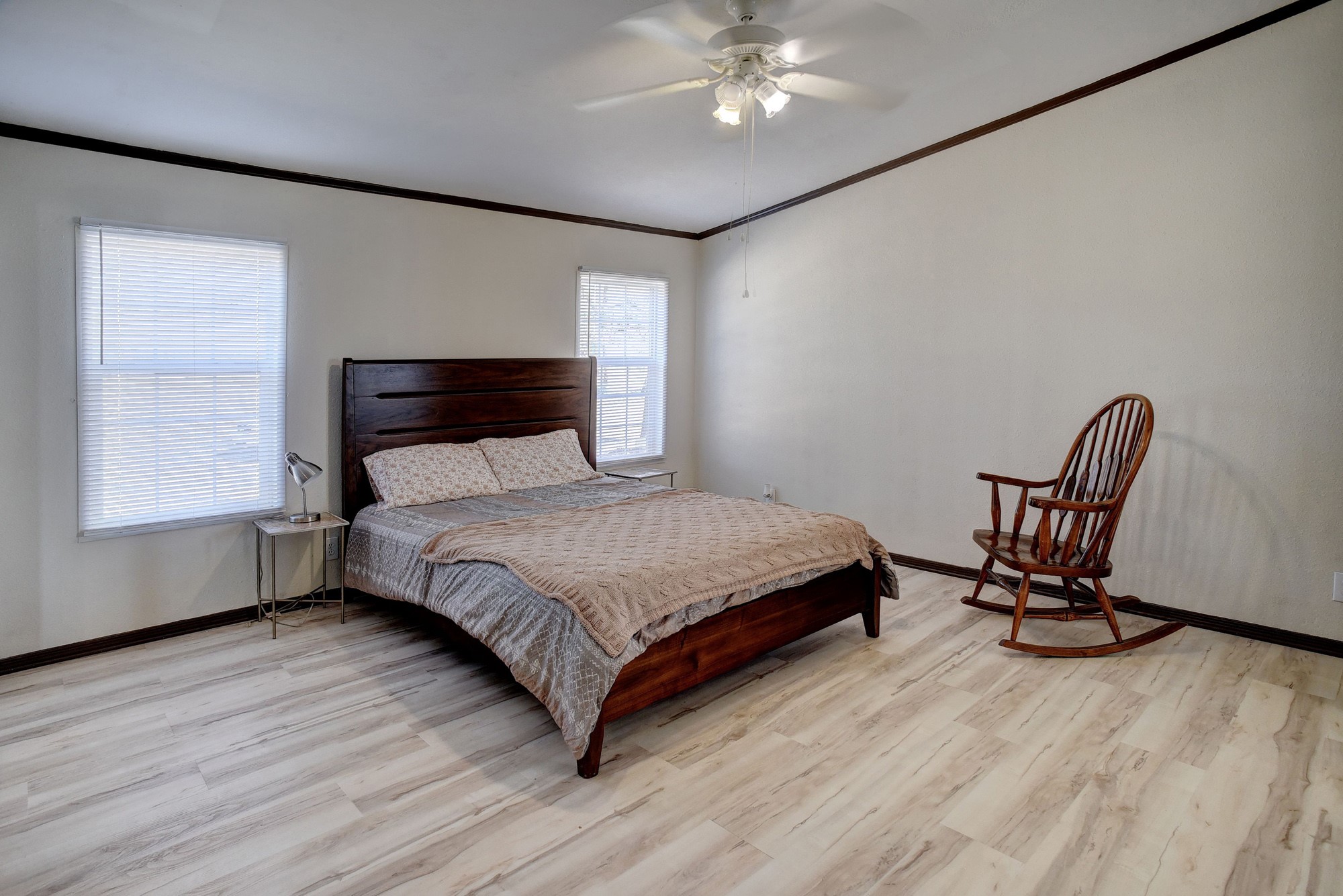 552 South Old Potato Road Paige, TX 78659 - Photo 15 of 40 The generously sized primary bedroom offers plenty of furnishing options.