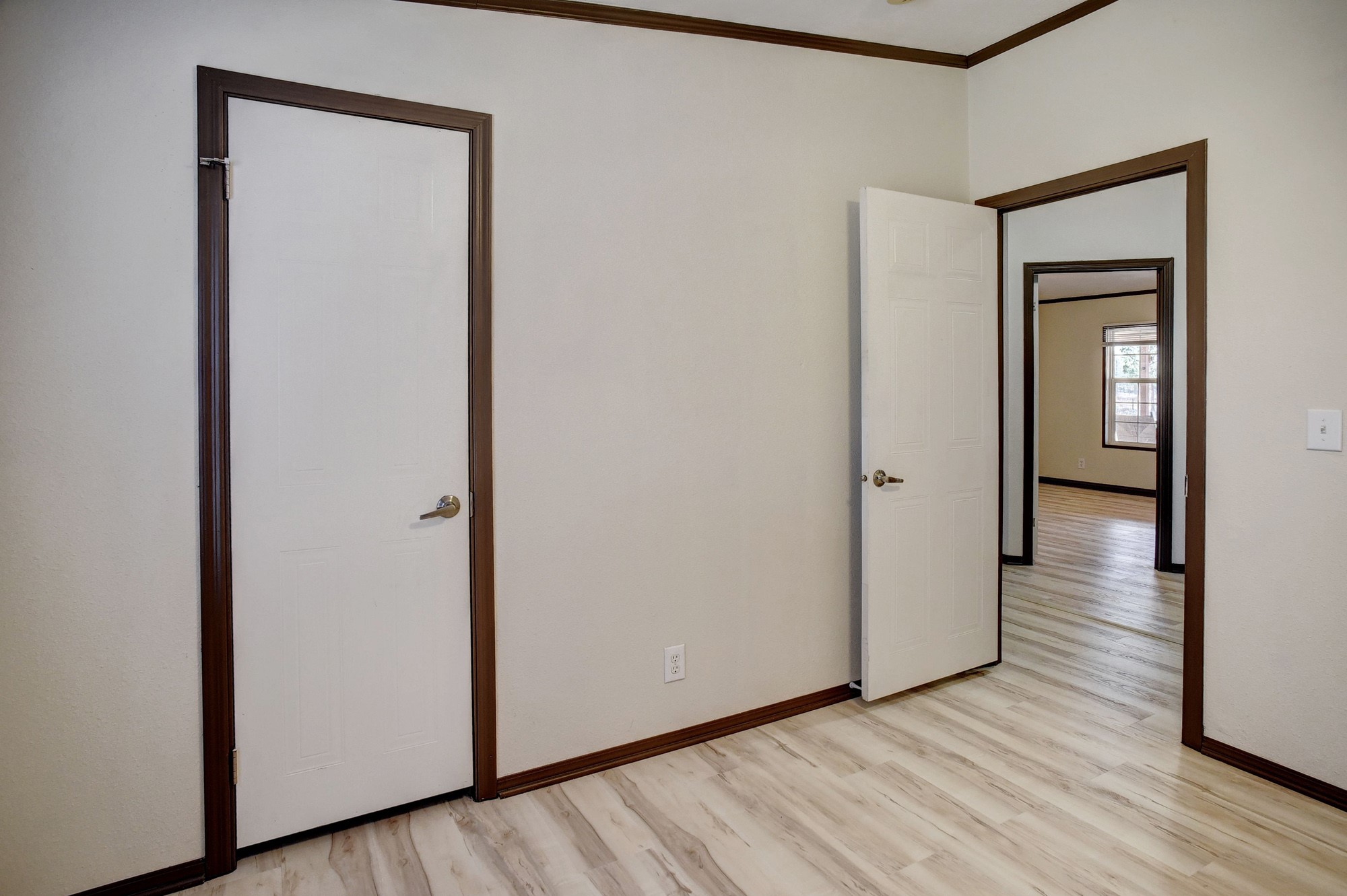 552 South Old Potato Road Paige, TX 78659 - Photo 24 of 40 Crown molding throughout adds a refined touch to every room.