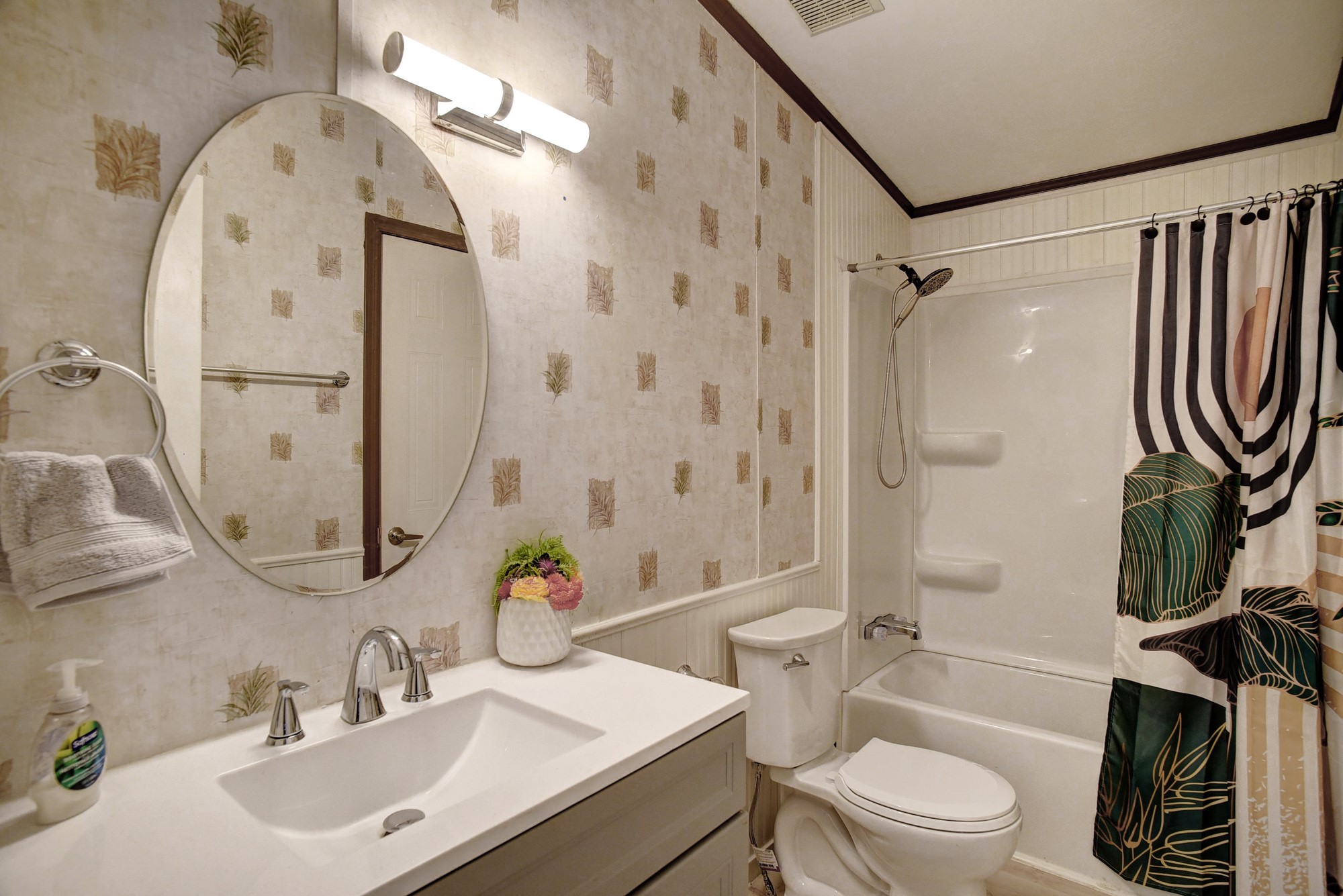 552 South Old Potato Road Paige, TX 78659 - Photo 25 of 40 a bathroom with a sink a toilet and a mirror