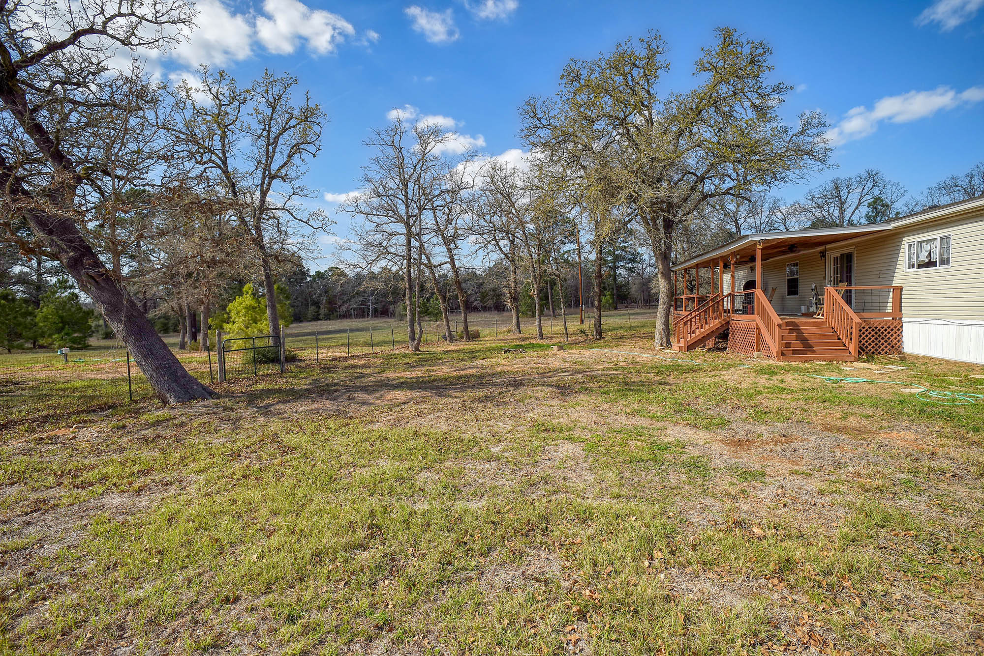 552 South Old Potato Road Paige, TX 78659 - Photo 36 of 40 So much room for outdoor adventure! Who wouldn't want a backyard like this?