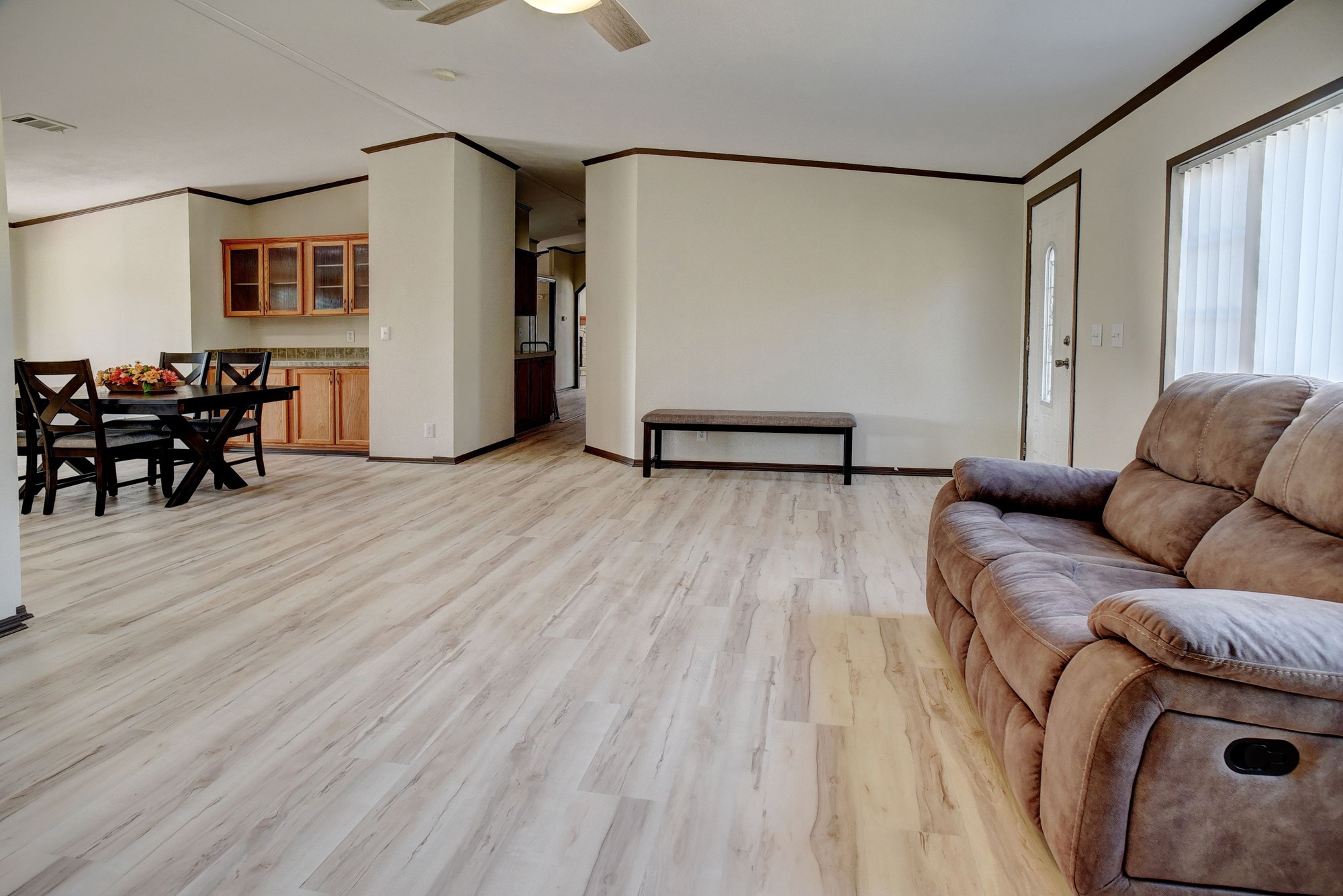 552 South Old Potato Road Paige, TX 78659 - Photo 6 of 40 a living room with furniture and a wooden floor