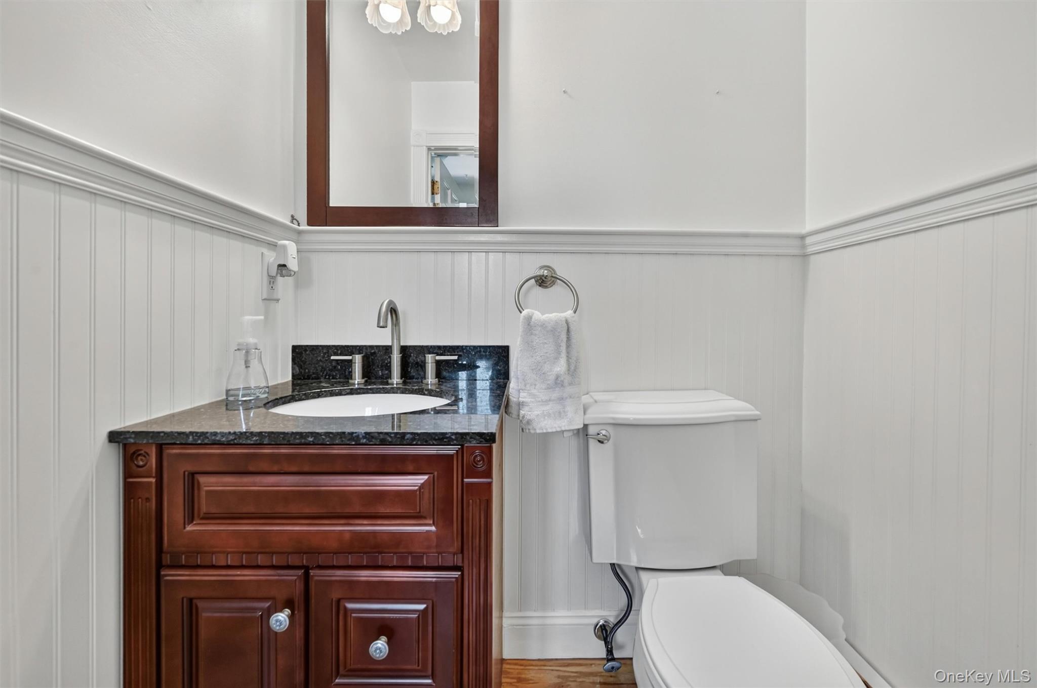 5 Hedges Road Warwick, NY 10990 - Photo 22 of 48 Conveniently located just off the mudroom/laundry room, this updated half bath adds everyday function right where it is needed most.