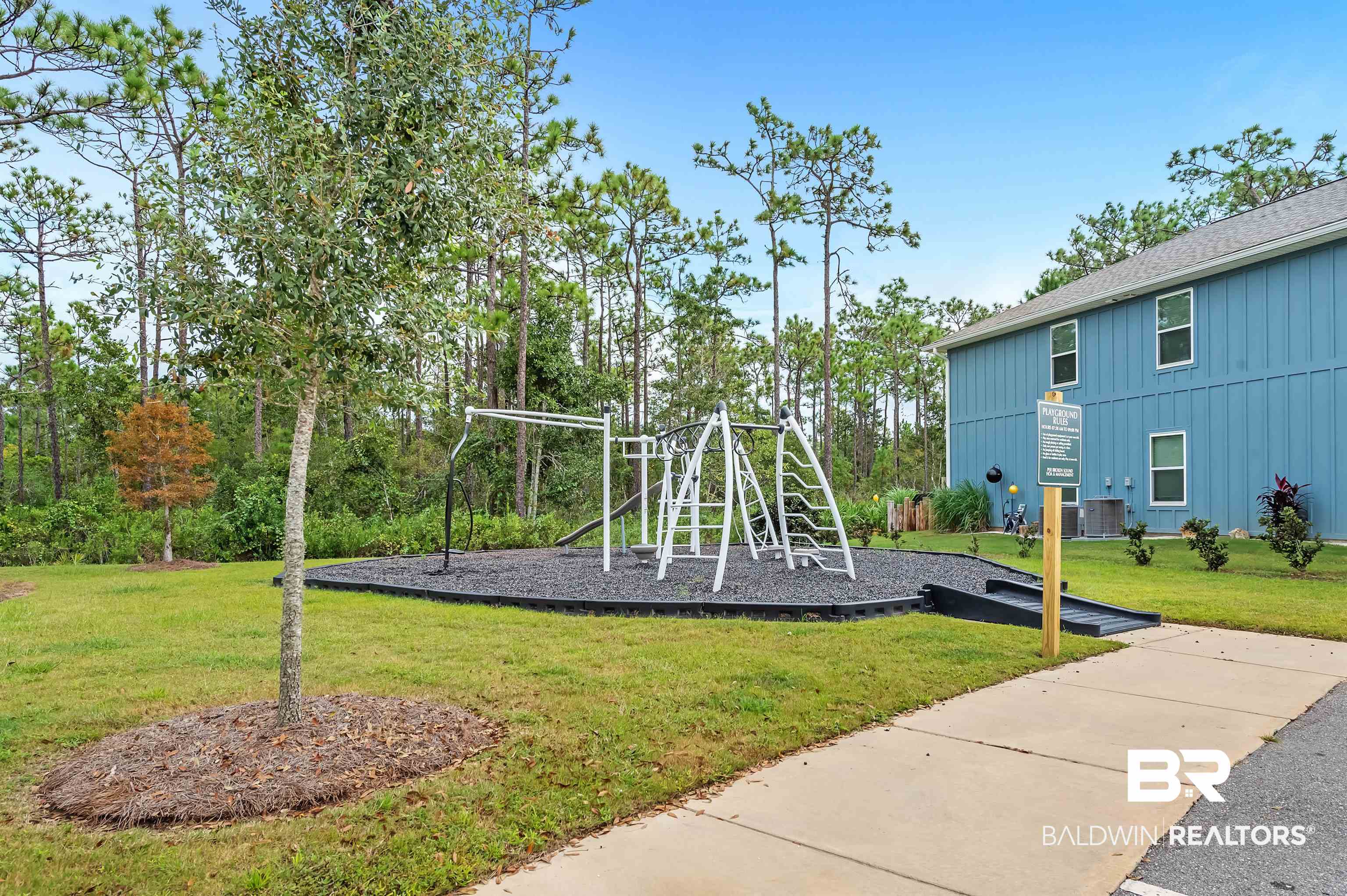 24549 Broken Sound Loop Orange Beach, AL 36561 - Photo 43 of 57 View of playground with cooling unit and a yard