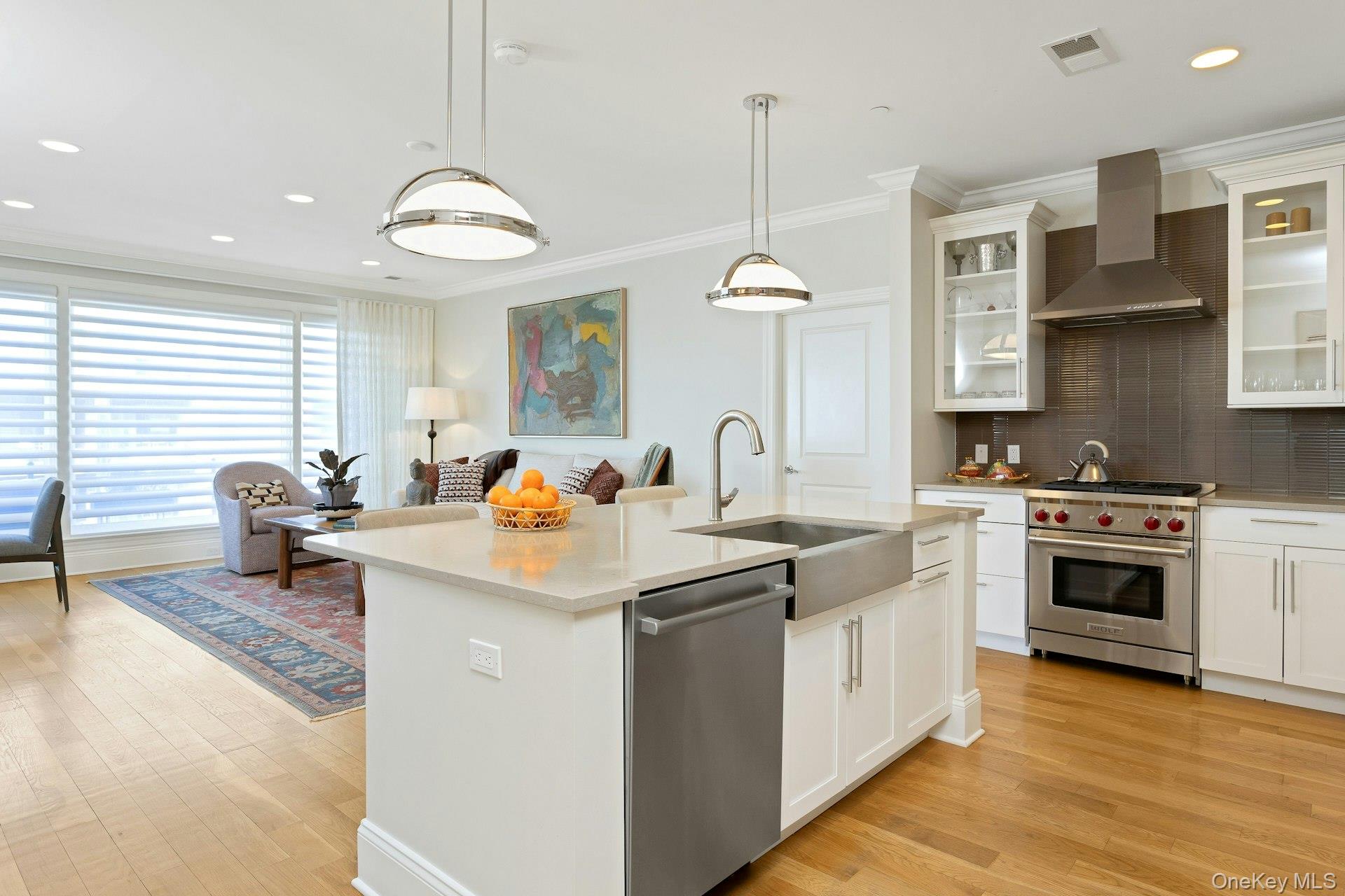 18 Rivers Edge Drive, Unit 305 Tarrytown, NY 10591 - Photo 11 of 34 a kitchen with stainless steel appliances granite countertop a sink stove and cabinets