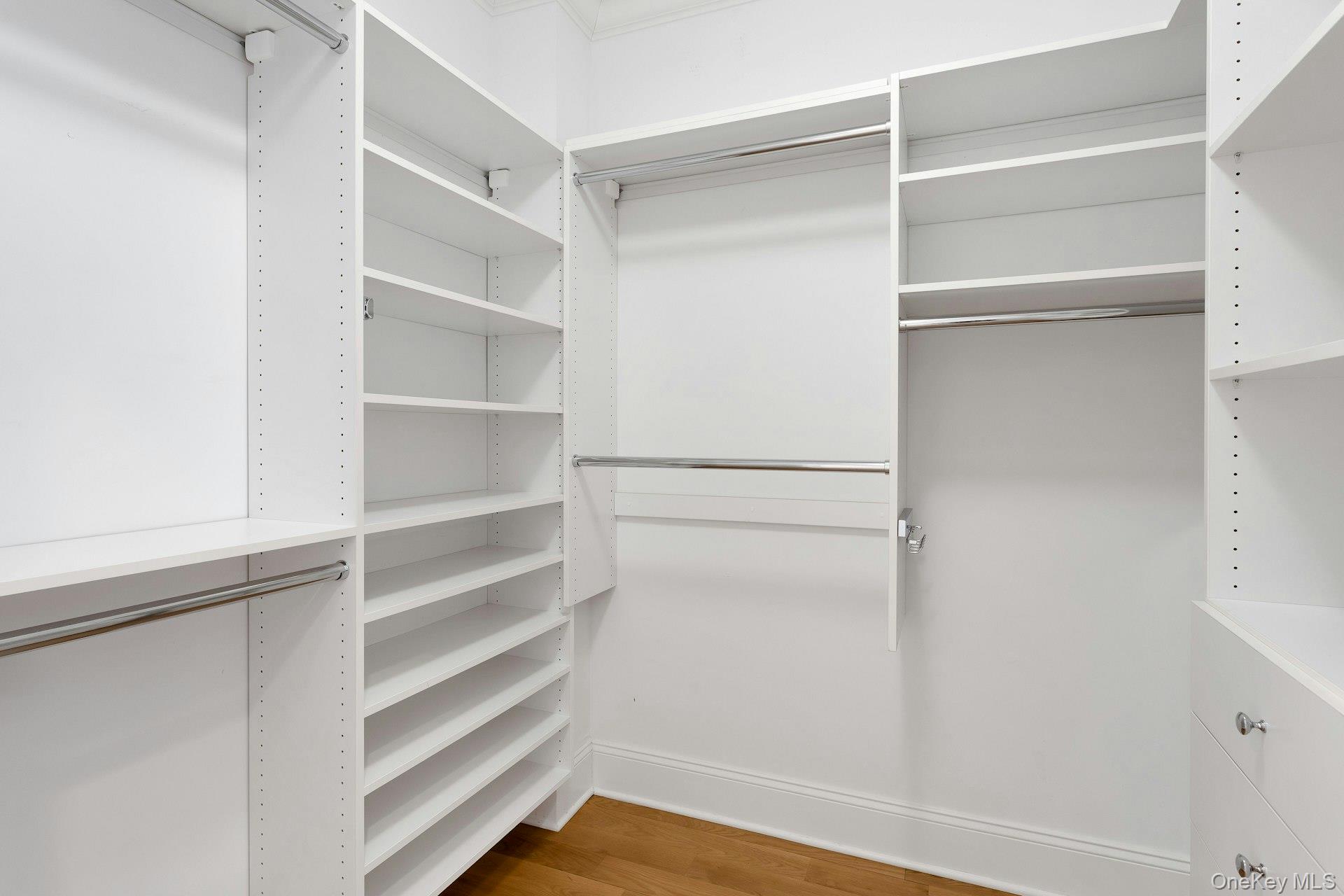 18 Rivers Edge Drive, Unit 305 Tarrytown, NY 10591 - Photo 19 of 34 a view of walk in closet with empty racks