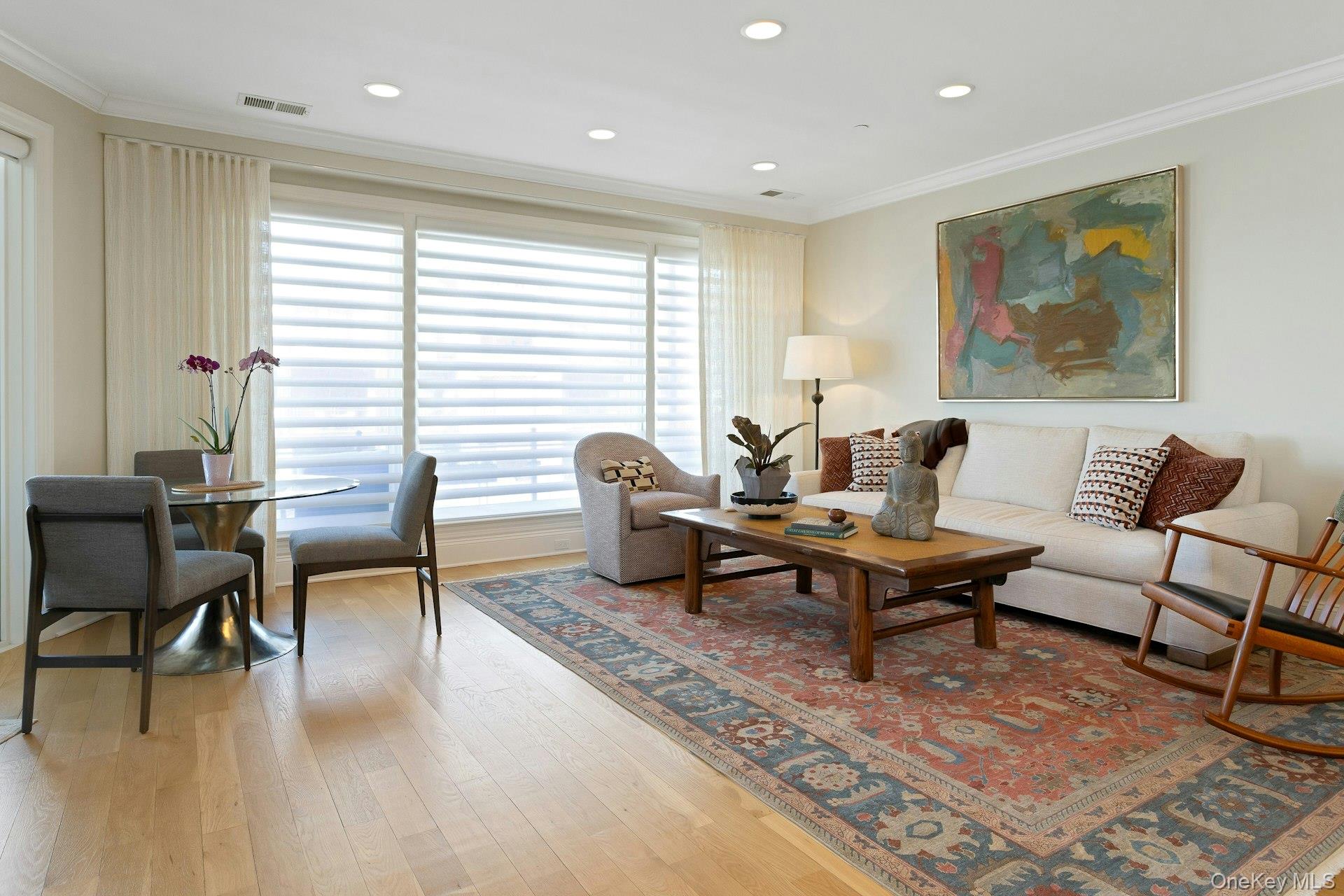18 Rivers Edge Drive, Unit 305 Tarrytown, NY 10591 - Photo 6 of 34 a living room with furniture and wooden floor