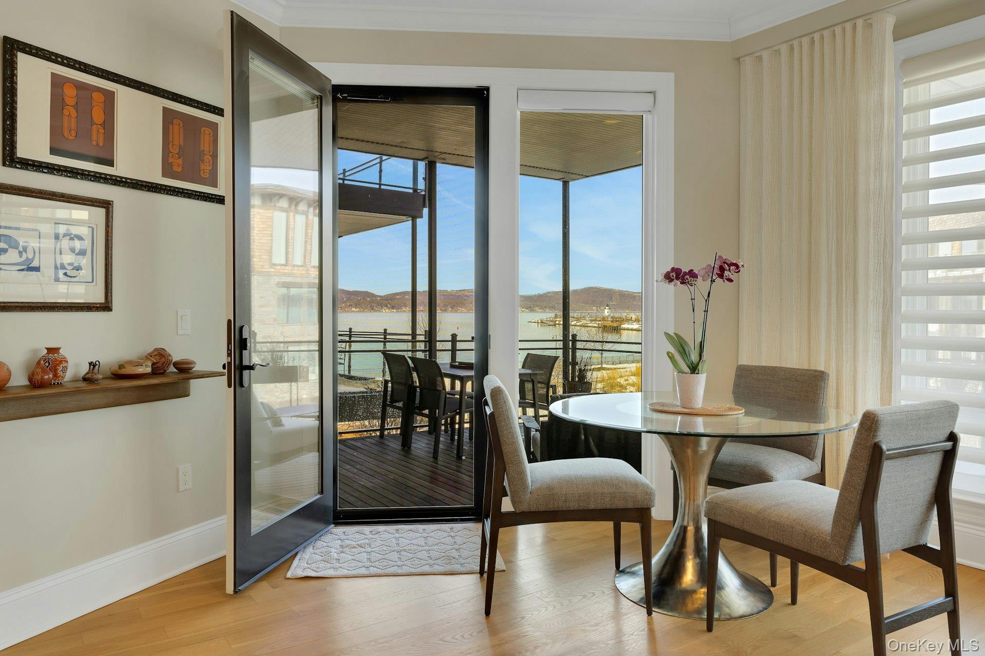18 Rivers Edge Drive, Unit 305 Tarrytown, NY 10591 - Photo 8 of 34 a view of a dining room with furniture window and outside view