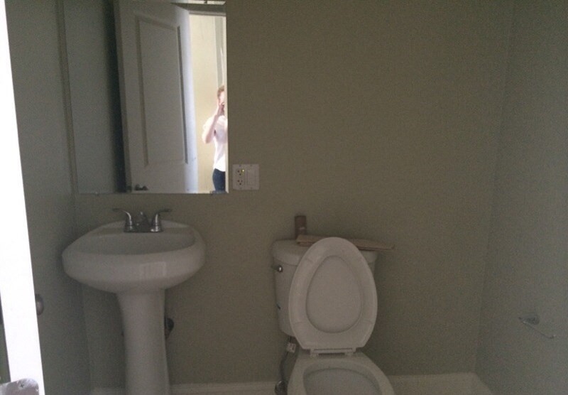 35 Forbes Street, Unit 1 Boston, MA 02130 - Photo 6 of 6 a bathroom with a toilet sink and mirror