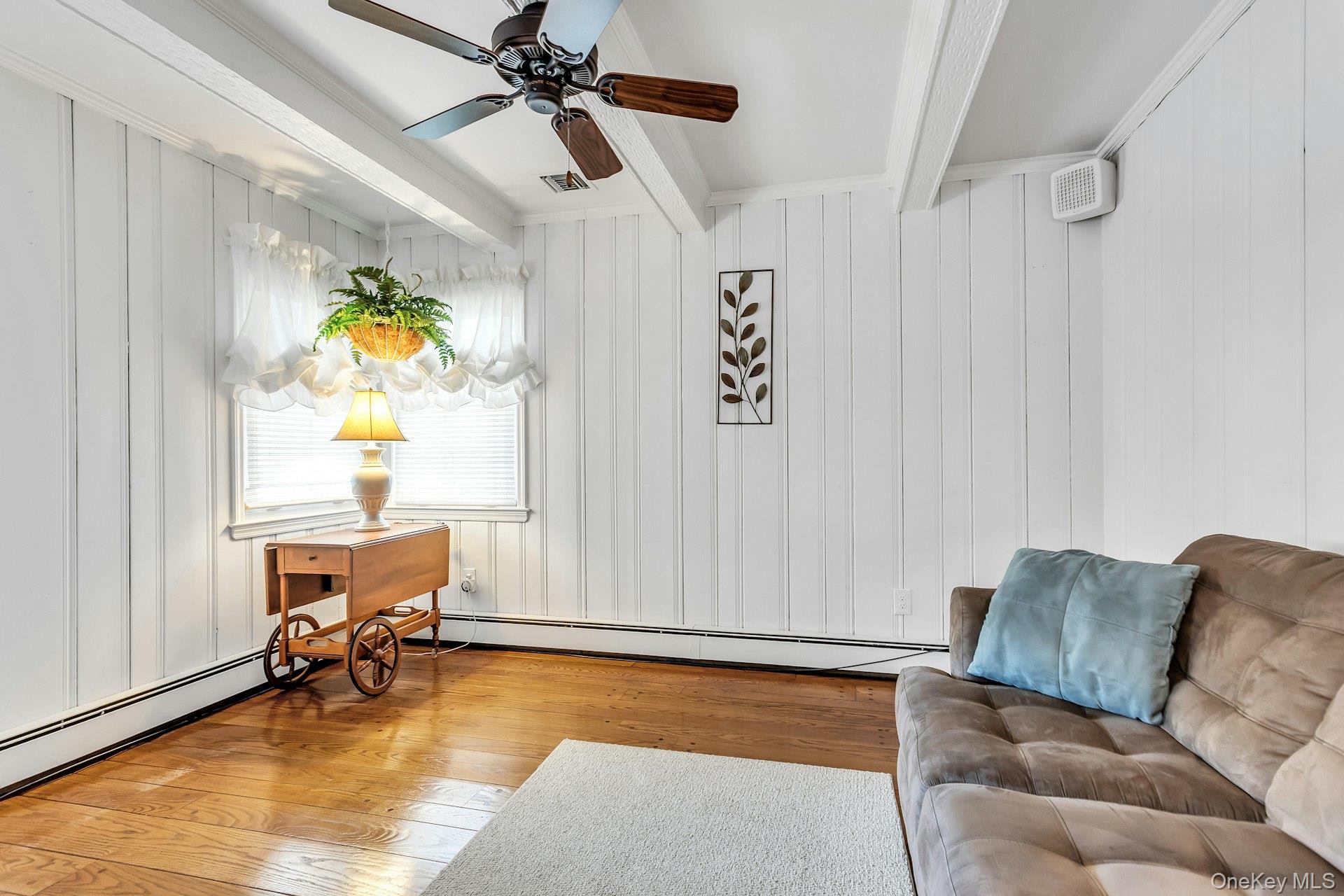 5 Sherwood Road Glen Cove, NY 11542 - Photo 11 of 26 Den with Beamed Ceiling and Hardwood Floors