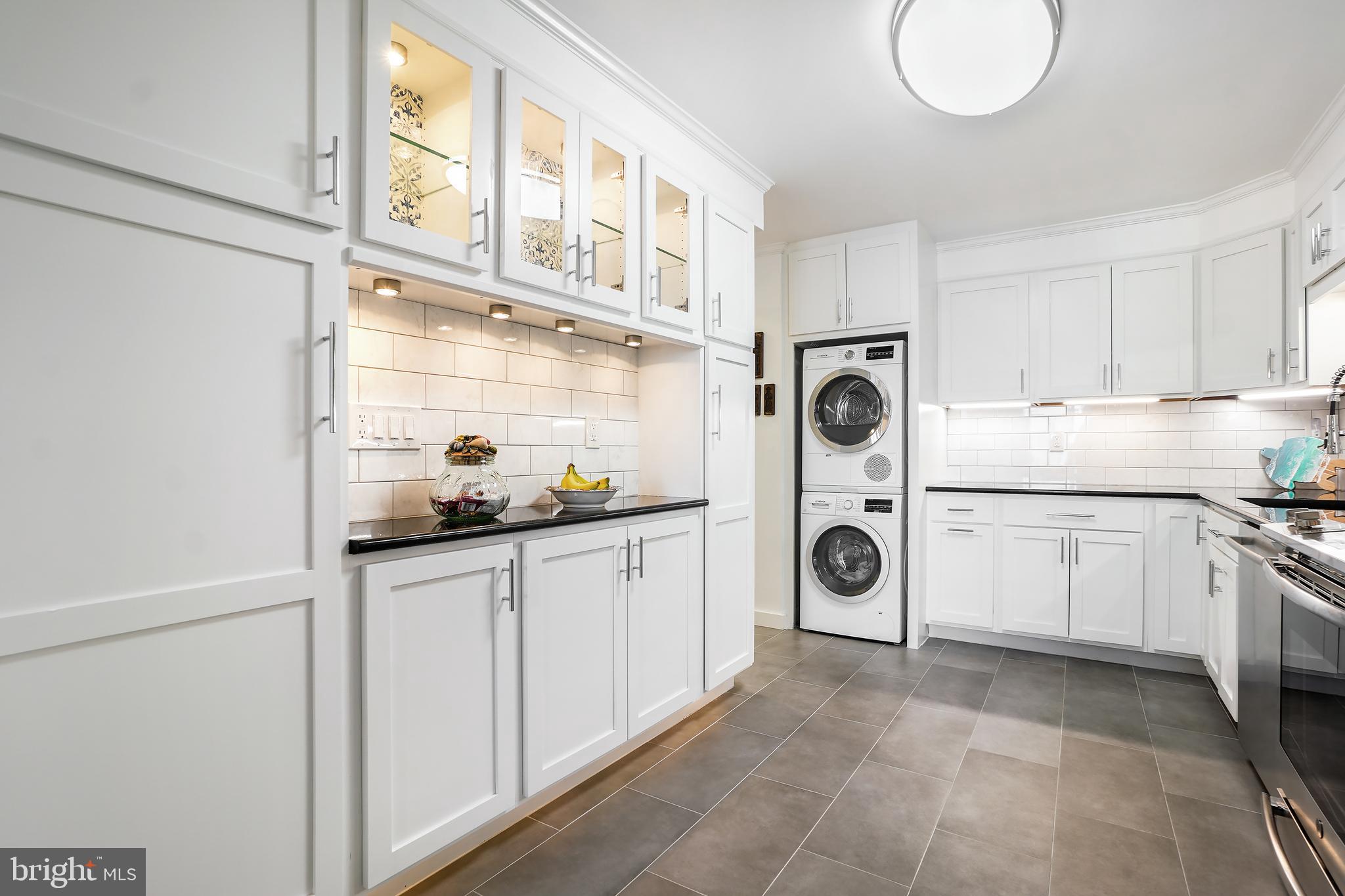 5902 Mt Eagle Drive, Unit 1615 Alexandria, VA 22303 - Photo 1 of 48 a kitchen with stainless steel appliances granite countertop a sink and cabinets