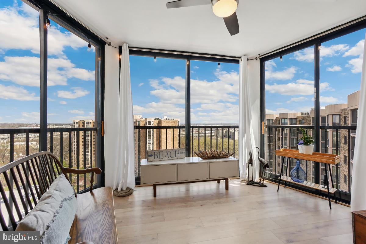 5902 Mt Eagle Drive, Unit 1615 Alexandria, VA 22303 - Photo 11 of 48 a living room with furniture and a large window