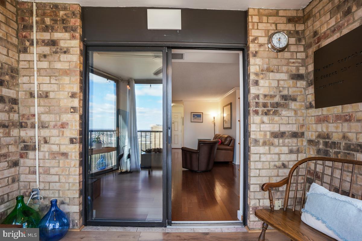 5902 Mt Eagle Drive, Unit 1615 Alexandria, VA 22303 - Photo 16 of 48 a view of a hallway with dining room and furniture
