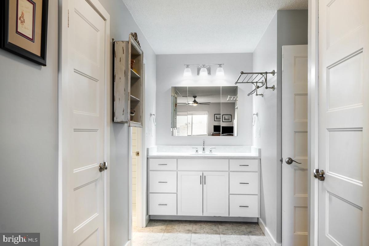 5902 Mt Eagle Drive, Unit 1615 Alexandria, VA 22303 - Photo 33 of 48 a spacious bathroom with a double vanity sink a mirror a bathtub and