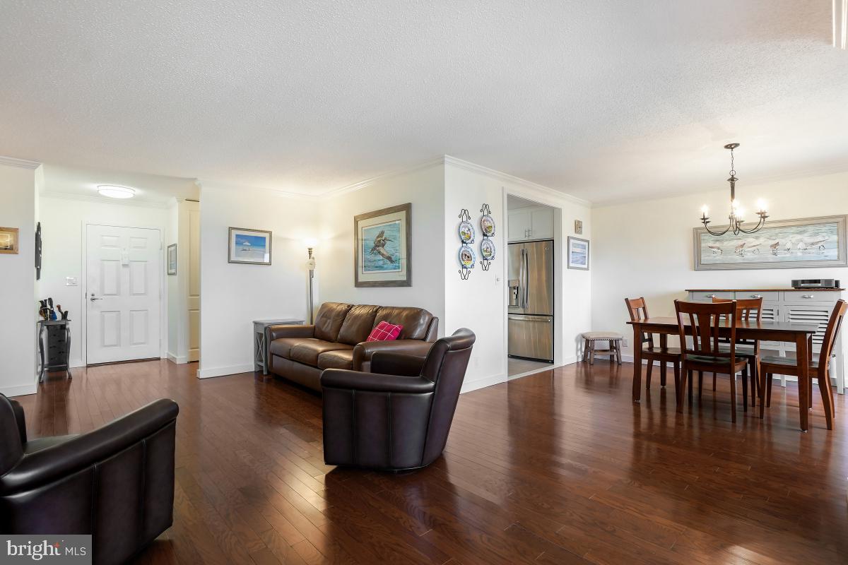 5902 Mt Eagle Drive, Unit 1615 Alexandria, VA 22303 - Photo 10 of 48 a living room with furniture and wooden floor