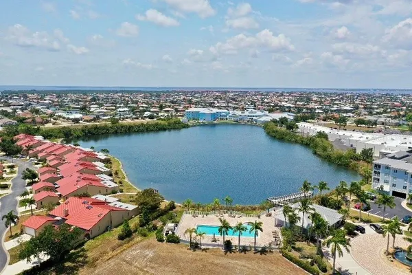 an aerial view of residential houses with outdoor space