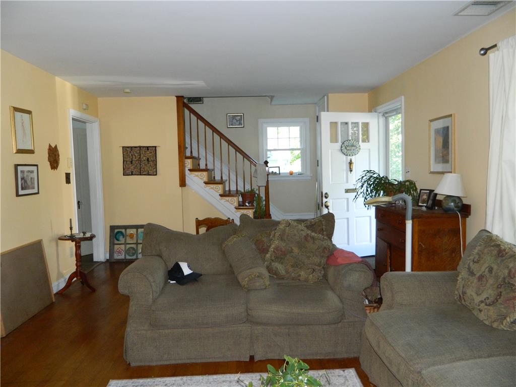 2130 Huntington Street Bethlehem, PA 18017 - Photo 6 of 23 Hardwood flooring extends throughout this inviting living space with an elegant staircase.